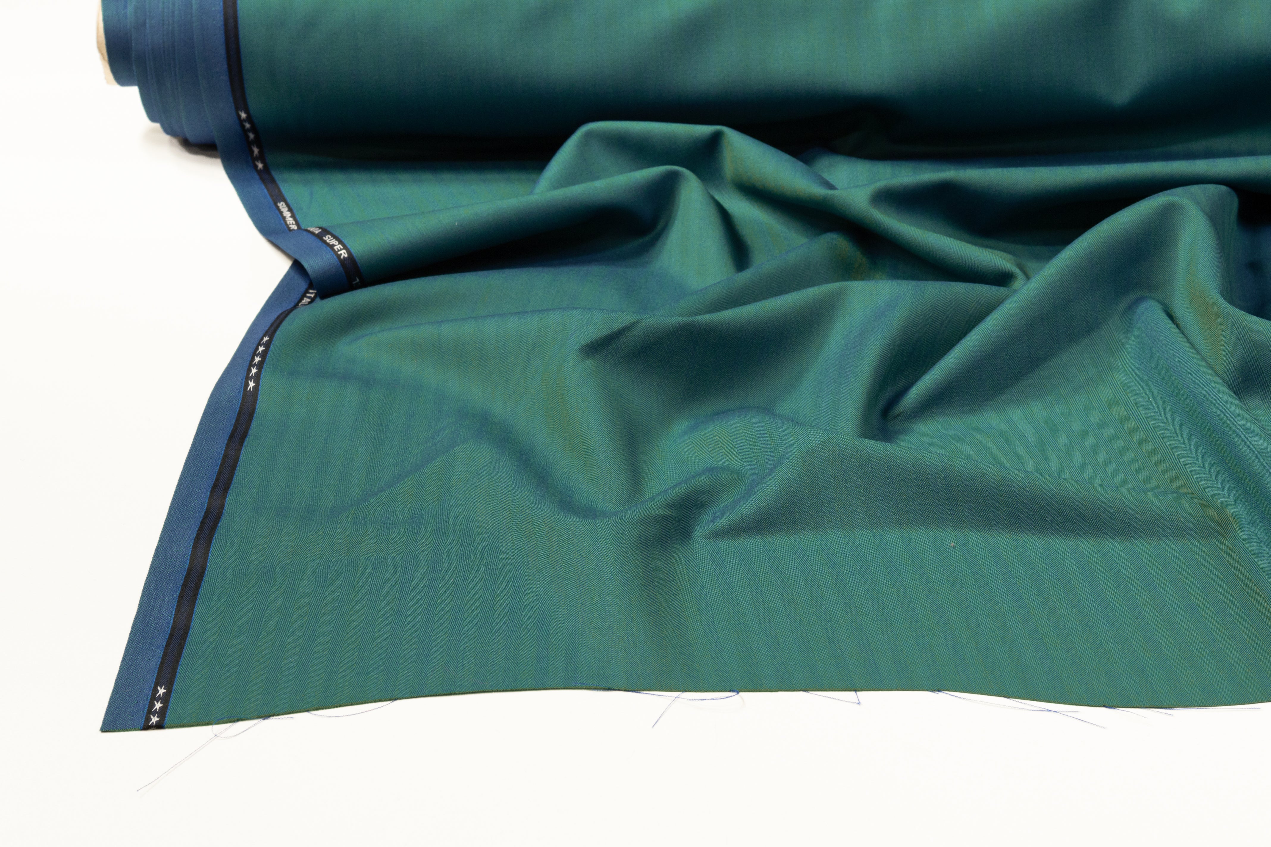 Iridescent Italian Summer Tasmania Super 130s Wool Suiting - Teal Blue