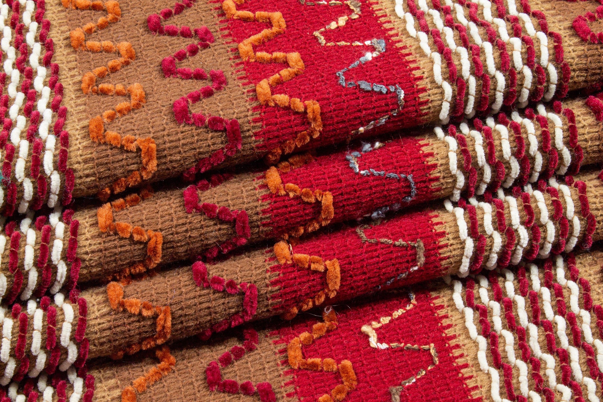 Red and Brown Polyester Knit - Prime Fabrics